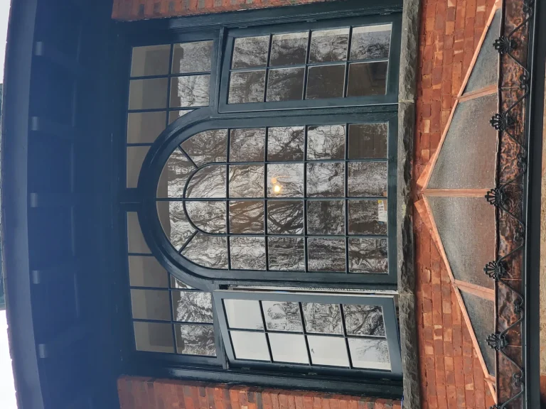 Iron Canopy Window & Door restoration by Olek Inc.