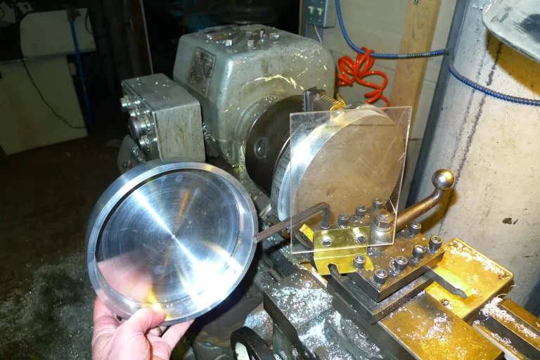 Sunball Lounge Chair hardware replication on lathe during restoration by Olek Inc., one of only seven made