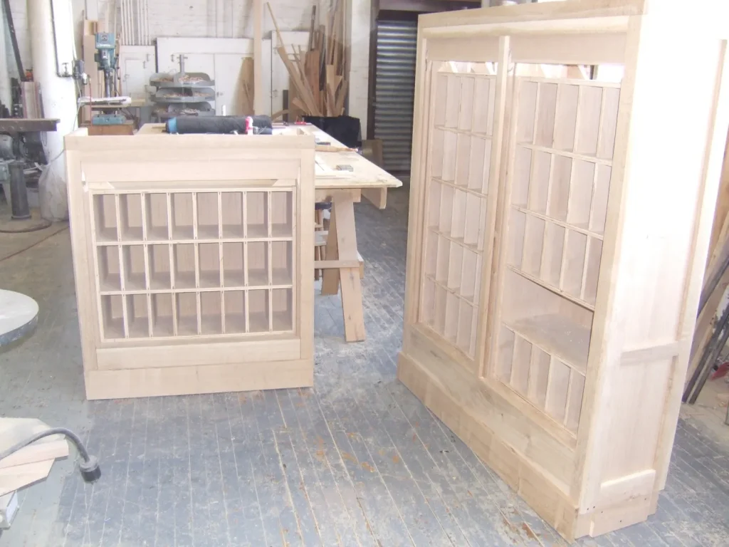 Lobby Woodwork — Desk & Cabinet Sculpting & Fabrication — Before