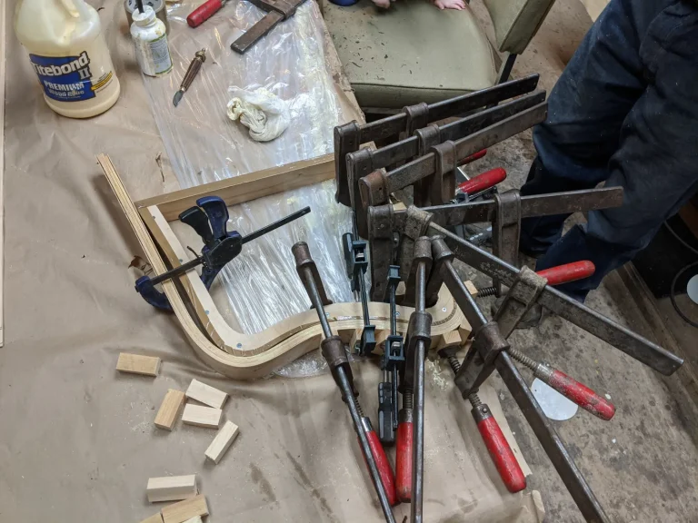 Mathsson bent plywood chair with delaminating leg before replication by Olek Inc.