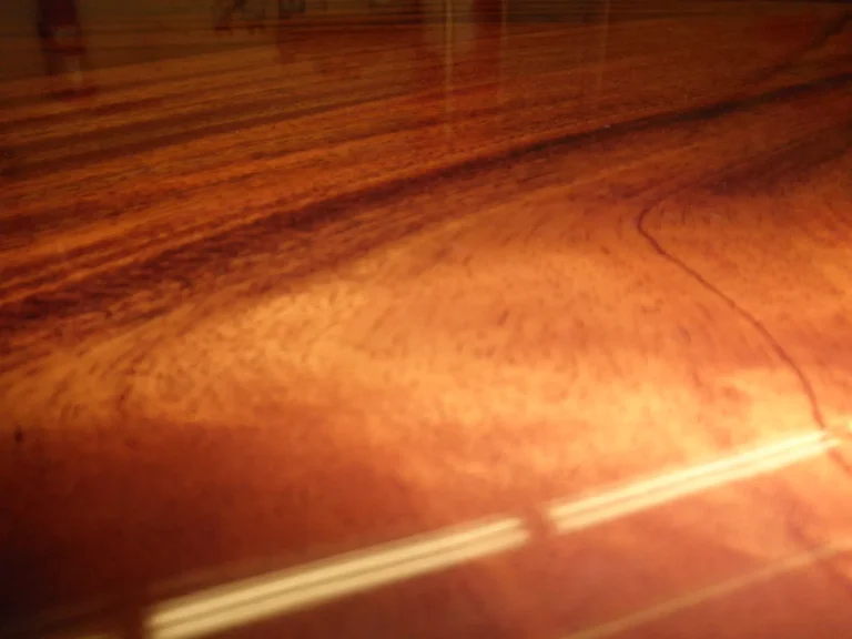 Piano Finish Dining Table — Chandelier Damage Repair