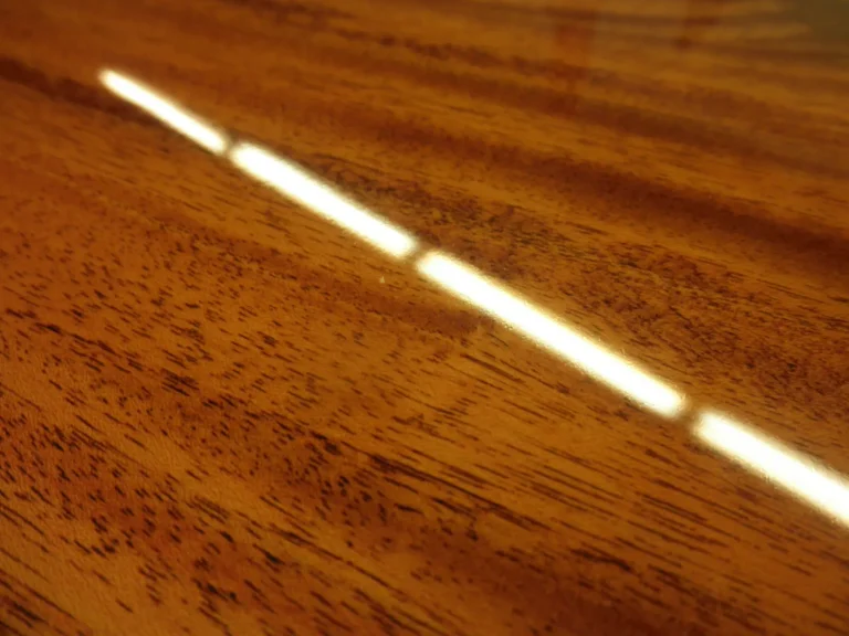 Piano Finish Dining Table — Chandelier Damage Repair