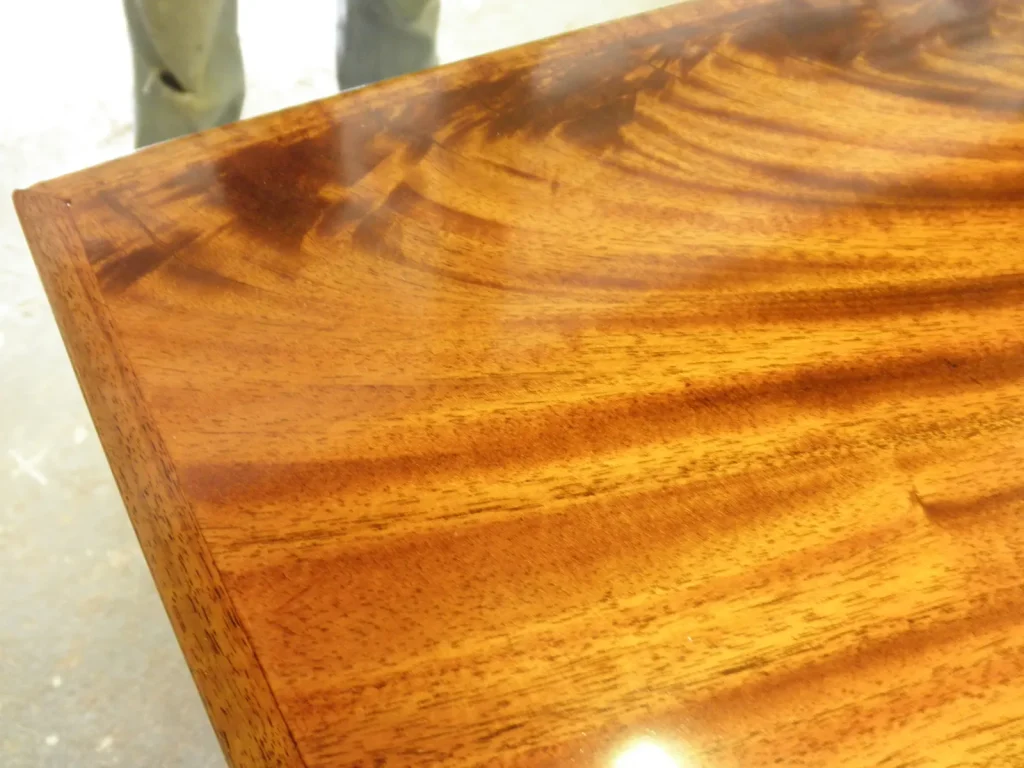 Piano Finish Dining Table — Chandelier Damage Repair — Before