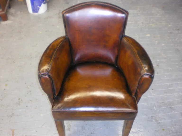 Art Deco Leather Armchair restoration by Olek Inc.