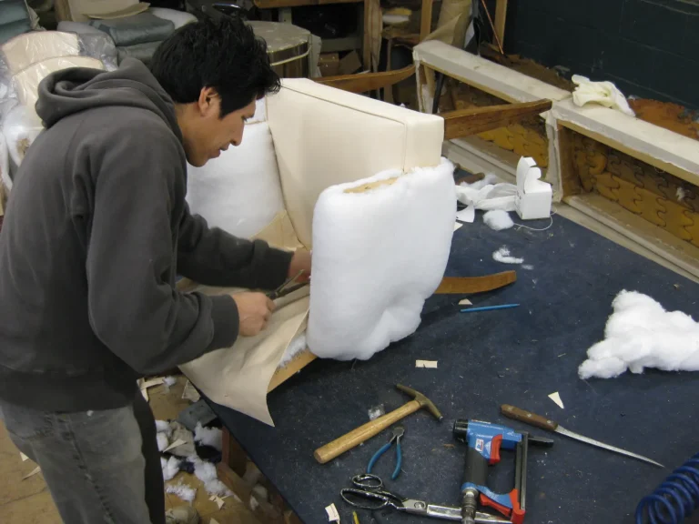 Art Deco Leather Armchair restoration by Olek Inc.