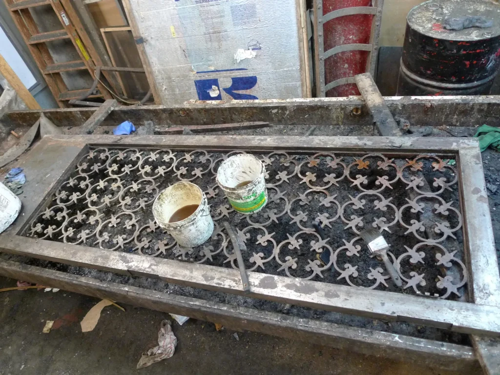 26 East 10th Street NYC wrought iron door after restoration by Olek Inc.