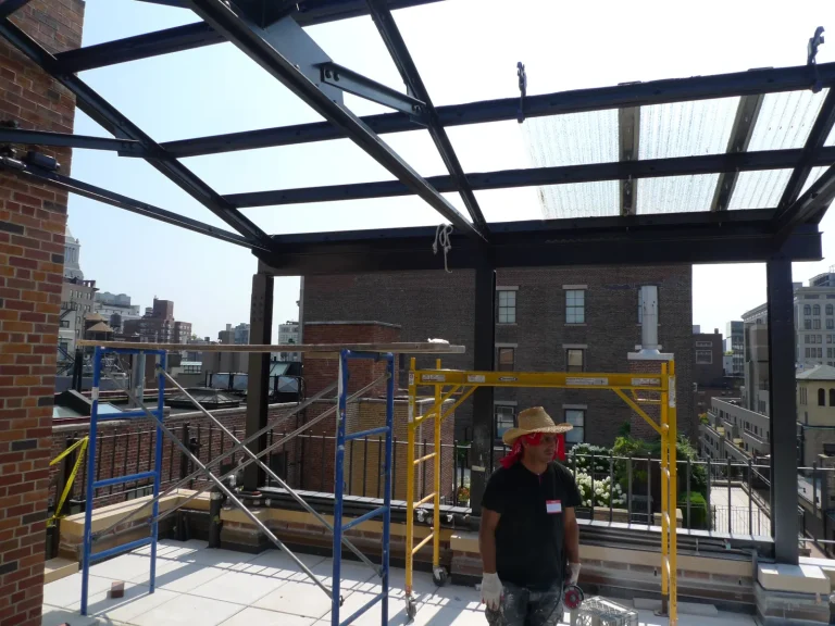 Pergola Fabrication with Salvaged Steel Windows — before restoration by Olek Inc.
