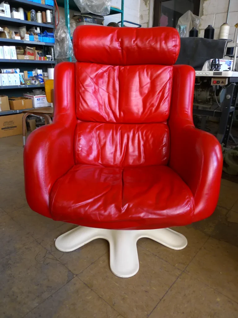 Karuselli fiberglass chair after repair and refurbishing by Olek Inc.