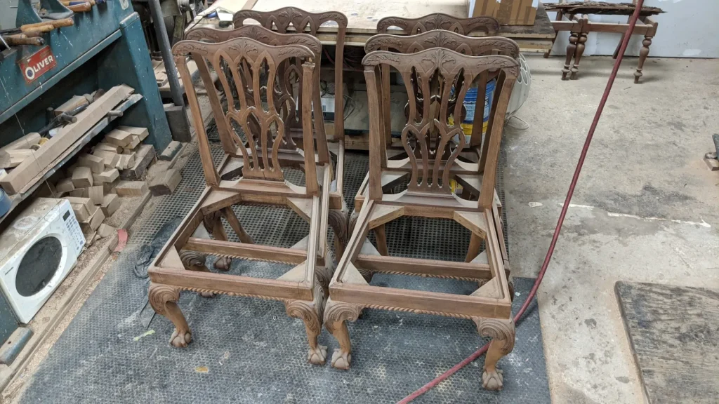 George III period mahogany dining table and chairs after conservation and restoration by Olek Inc.