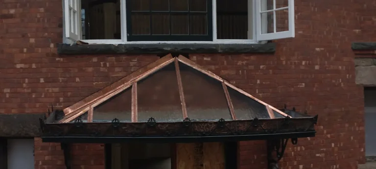 Iron Canopy Window & Door restoration by Olek Inc.